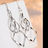 eleven silver earrings